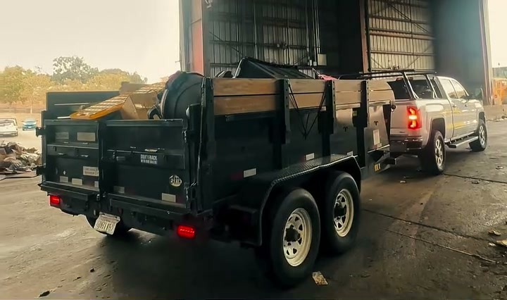 The bin trailer loaded up with household items